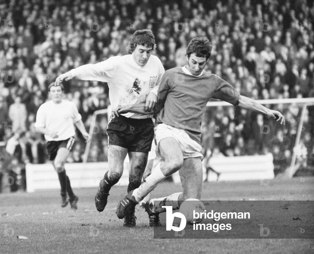 FA Cup First Round match at Craven Cottage. Fulham 1 v Bristol Rovers 2. Bristol's Stuart Taylor beats Vic Halom of Fulham to the ball, 21st November 1970 (b/w photo)