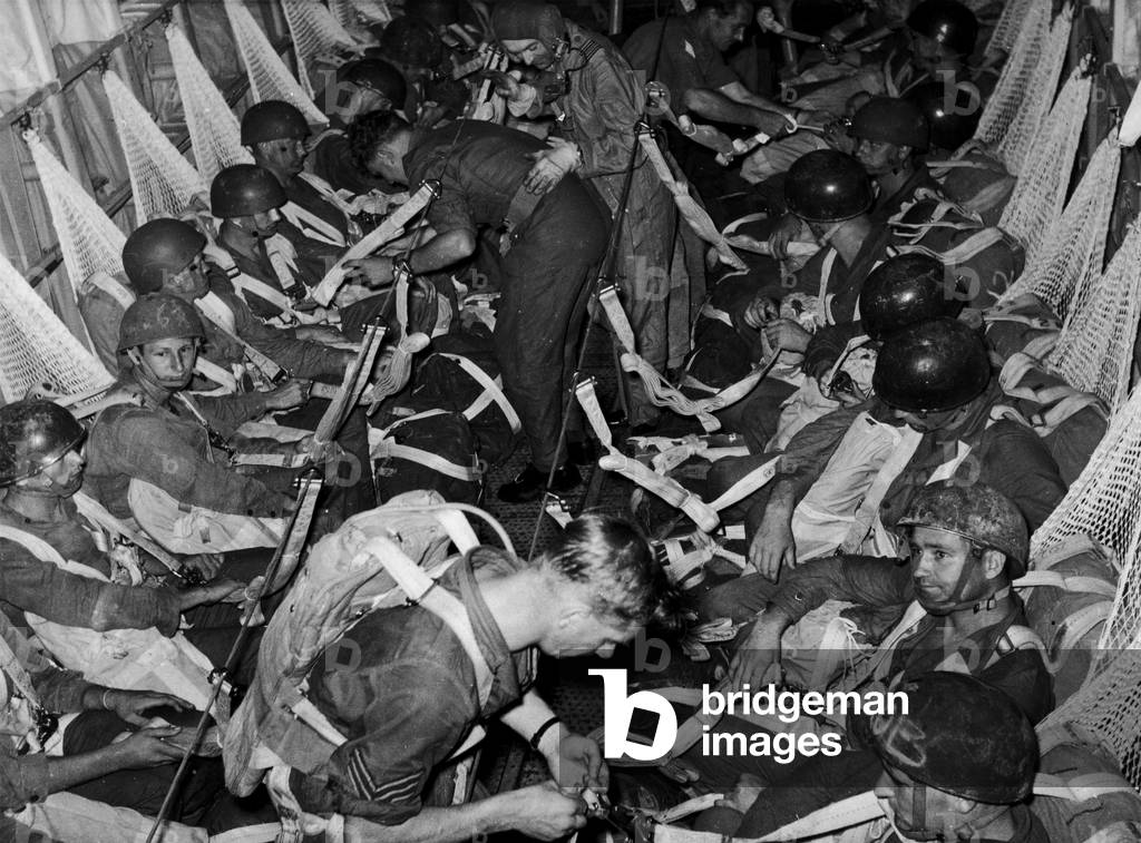 Emergency in Malaya. The 22nd Special Air Service Regiment seen here sitting calmly in the aircraft before tree parachuting (a technique of low level parachuting) on to the communist insurgents in the Malayan jungle. 29th October 1959 (b/w photo)
