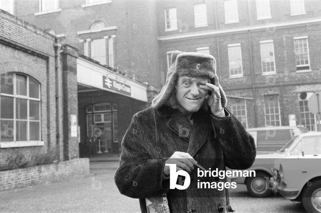 A day in the life of Jimmy Saville' Feature by Mike Hellicar. Here he is pictured outside kings Cross railway station, 7th October 1971 (b/w photo)