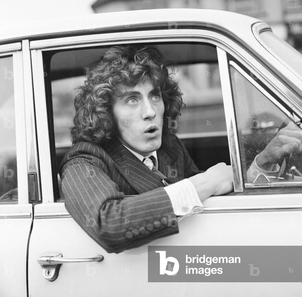 Roger Daltrey, singer of British rock group The Who, pictured after his appearance in court at Luton, Bedfordshire on six motoring offences. 24th January 1969 (b/w photo)