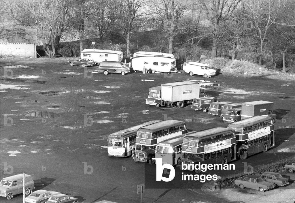 A gypsy encampment in a Carlisle carpark in February 1975 (b/w photo)