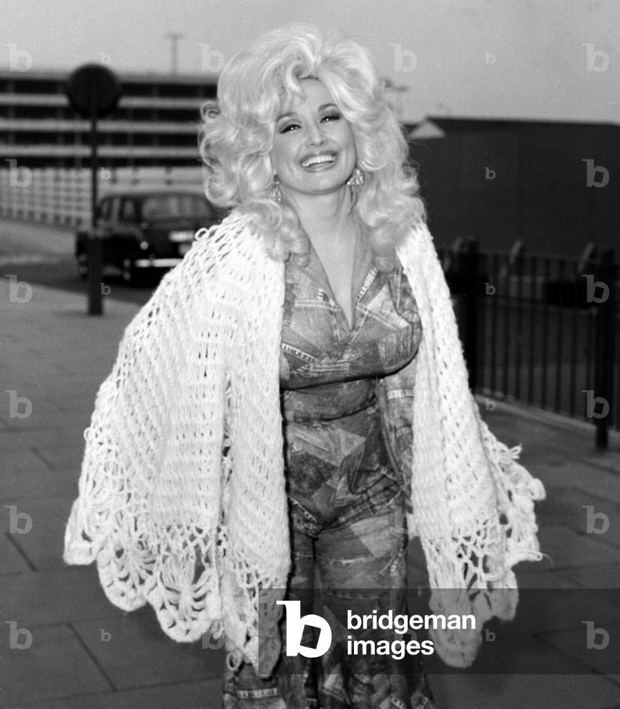 Dolly Parton seen here at London Airport 16th April 1976 (b/w photo)