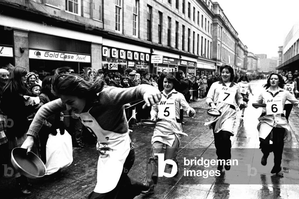 The Shrove Tuesday Jiff Lemon's Pancake Race in Clayton Street, Newcastle on 21st February 1979 (b/w photo)