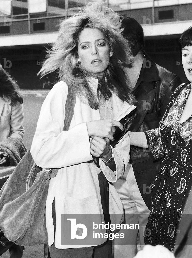 Farrah Fawcett actress at Heathrow Airport, 10th May 1979 (b/w photo)