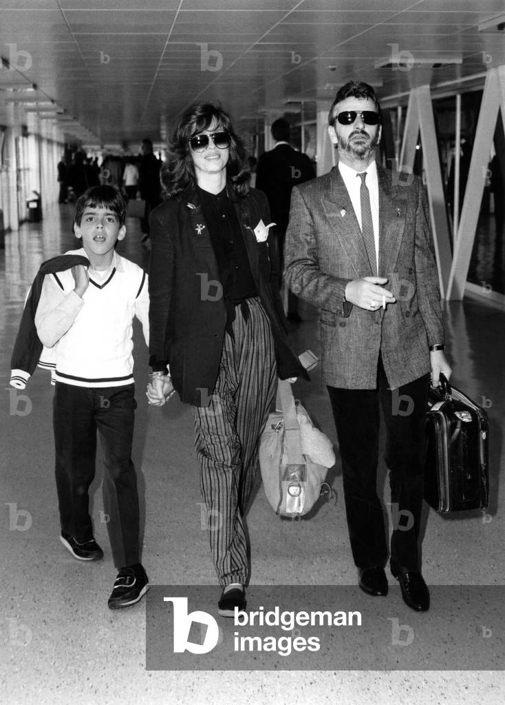 Ringo arrival. Ringo Starr arriving at Heathrow with wife Barbara Bach and her son. June 1983 P017278