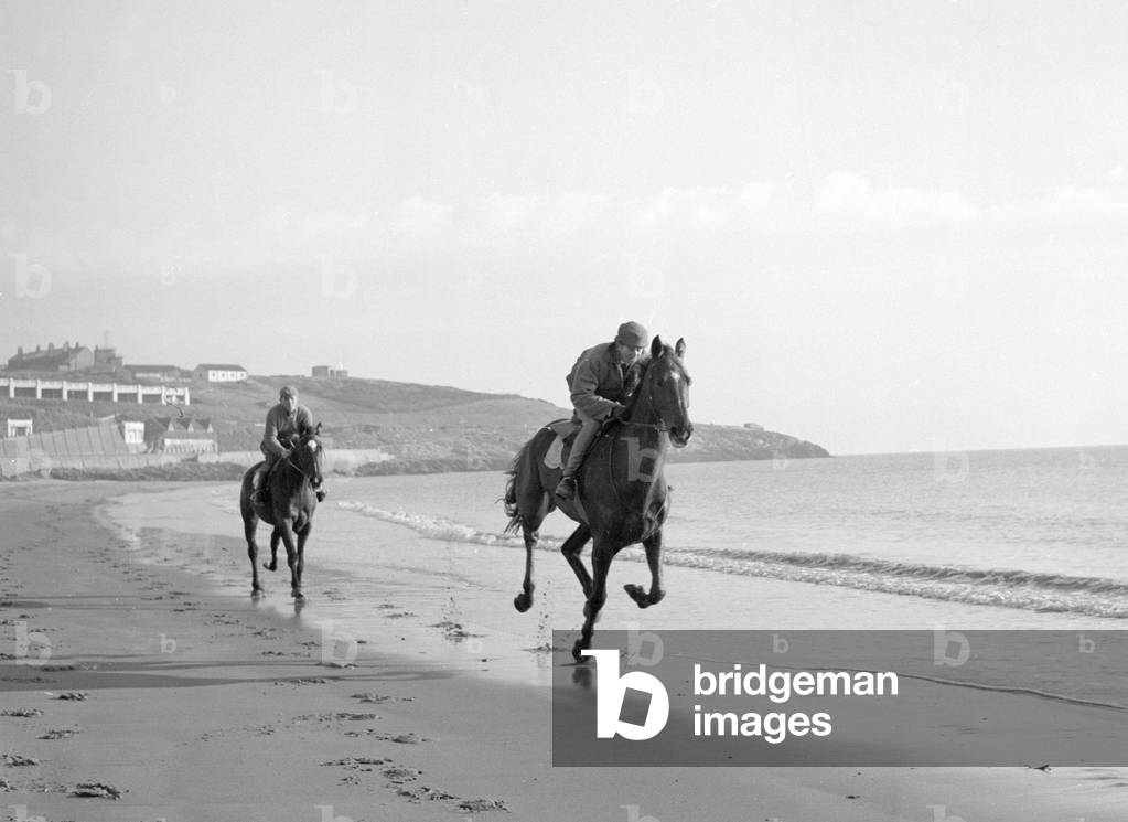 Beating the freeze along the beach at Barry Island, Cheltenham hopefuls 