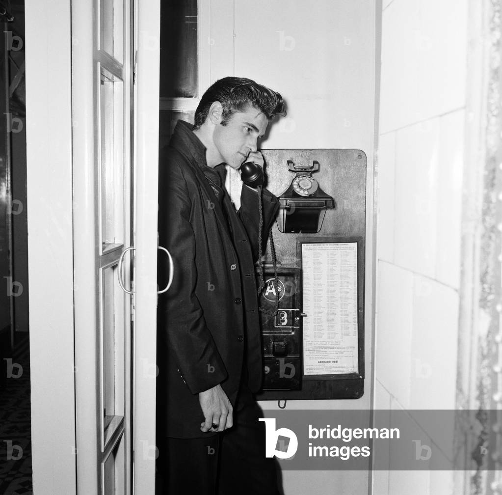 Vince Taylor, Roll & Roll Singer, visits Julia Lockwood, daughter of actress Margaret Lockwood, at the Ear, Nose and Throat Hospital, Golden Square, London, 28h September 1960 (b/w photo)