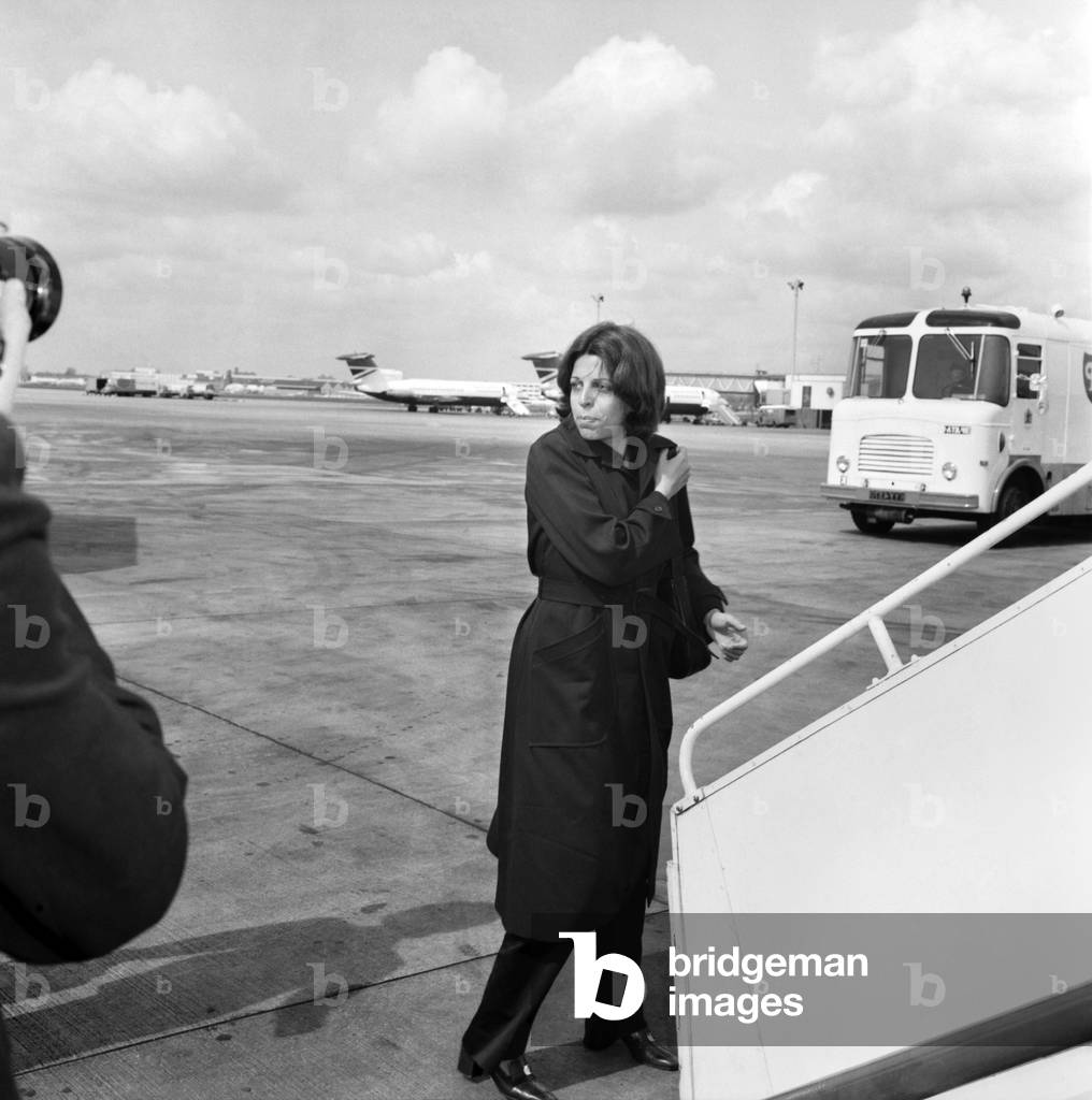 Christine Onassis flew into Heathrow Airport today - first class, of course - from Nassau in the Bahamas where she went on holiday shortly after the death of her father, April 1975 (b/w photo)