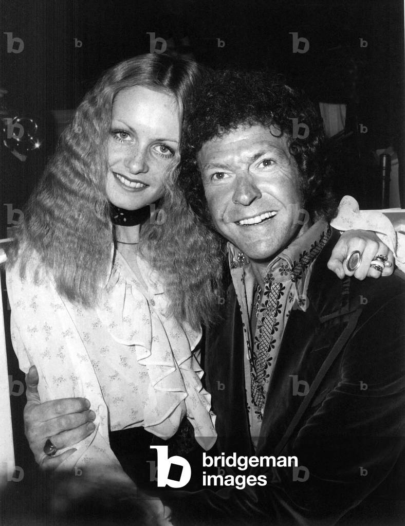 Twiggy, real name Lesley Hornby, with singer Joseph Ward at a reception at the Ritz Hotel, London