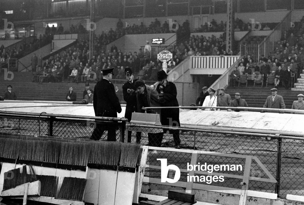 Queens Park Rangers 1 v. Northampton Town 3. Fans invade the pitch at Loftus Road. February 1963 (photo)