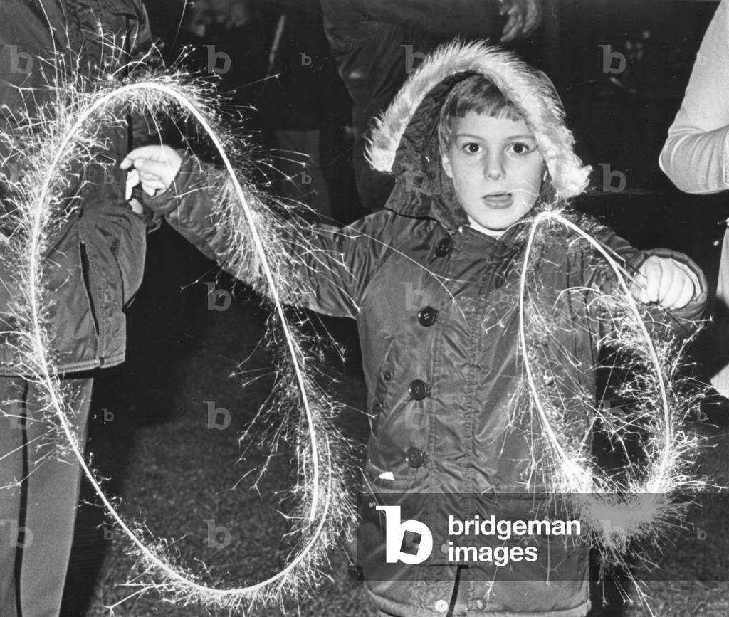 Andrew Backhouse aged 7 of Acklam seen here enjoying sparklers on bonfire night in Middlesbrough 5th November 1979 (b/w photo)