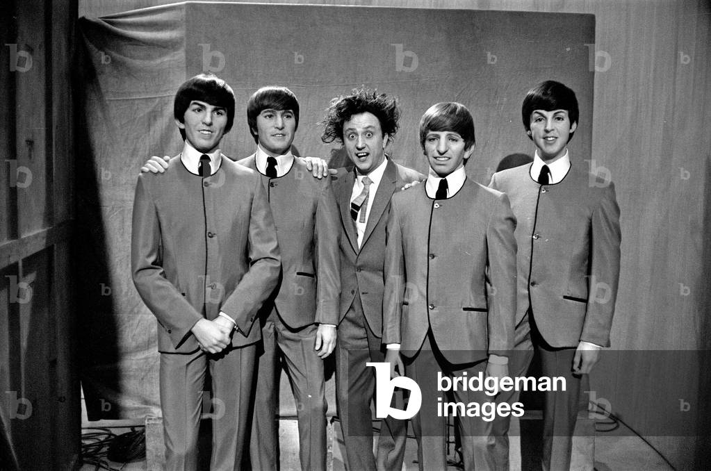 Ken Dodd with Madame Tussauds figures of the Beatles, May 1964