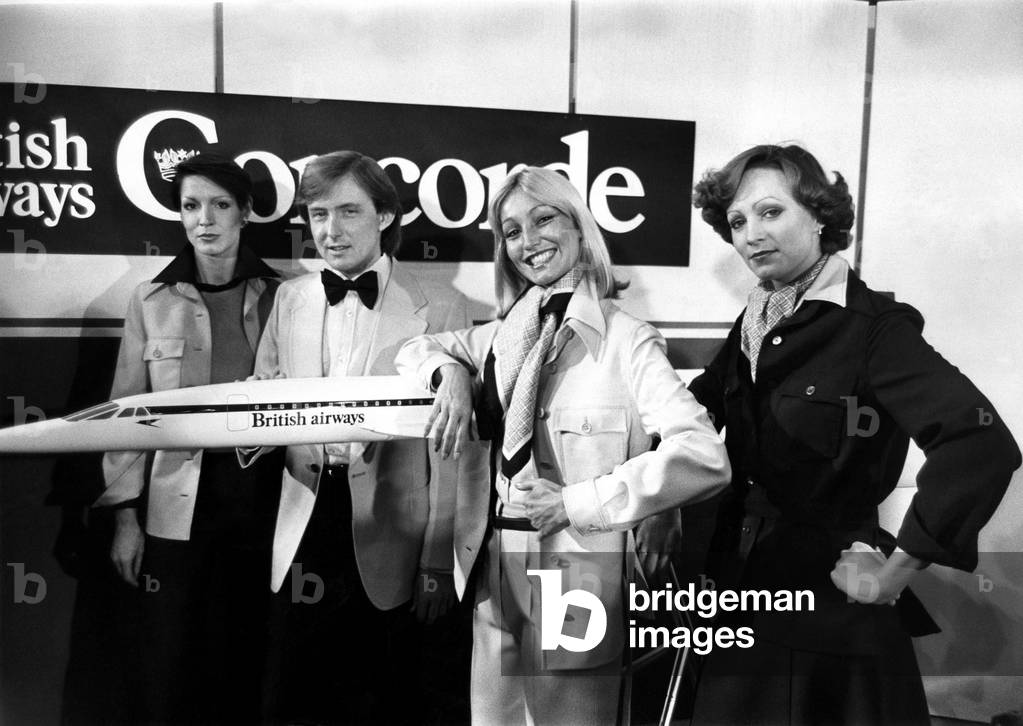 The new Hardy Amies designed for the British Airways cabin crew of the Concorde were shown in London. For supersonic travel the designers have taken quite a revolutionary approach, which allows the individual to choose, from a variety of garments in two colours, the permutation suiting him or her best at any time in any place while preserving the British Airways visual identity. The Concorde inaugurates the world's first international supersonic passenger service on January 21st, at 11.30am between London and Bahrain. 14/01/1976 (b/w photo)