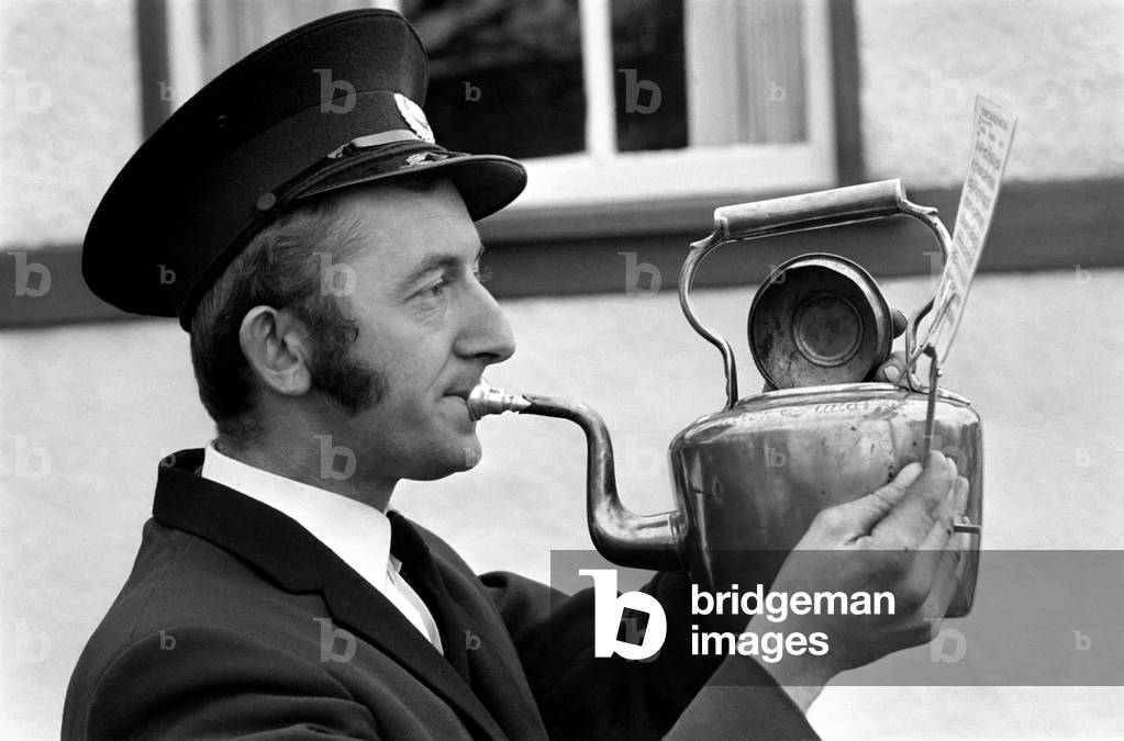 Man playing the kettle for the Pilling Jubilee Silver Band. November 1969