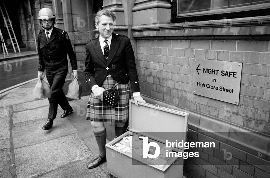 50 year old Cornishman Frederick Trull a member of the Cornish Stannery Parliament has had £50,000 worth of his own Cornish money printed and has already exchanged £1,000 of it against English money, 15th January 1975 (b/w photo)