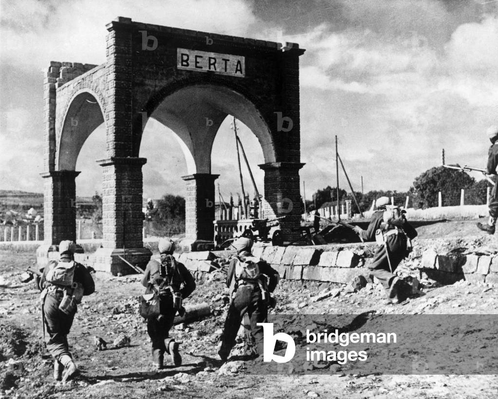 Sikh soldiers, members of the India forces fighting alongside the British 8th Army in the Libya offensive entering Giovanni Berta, 23th January 1942 (b/w photo)