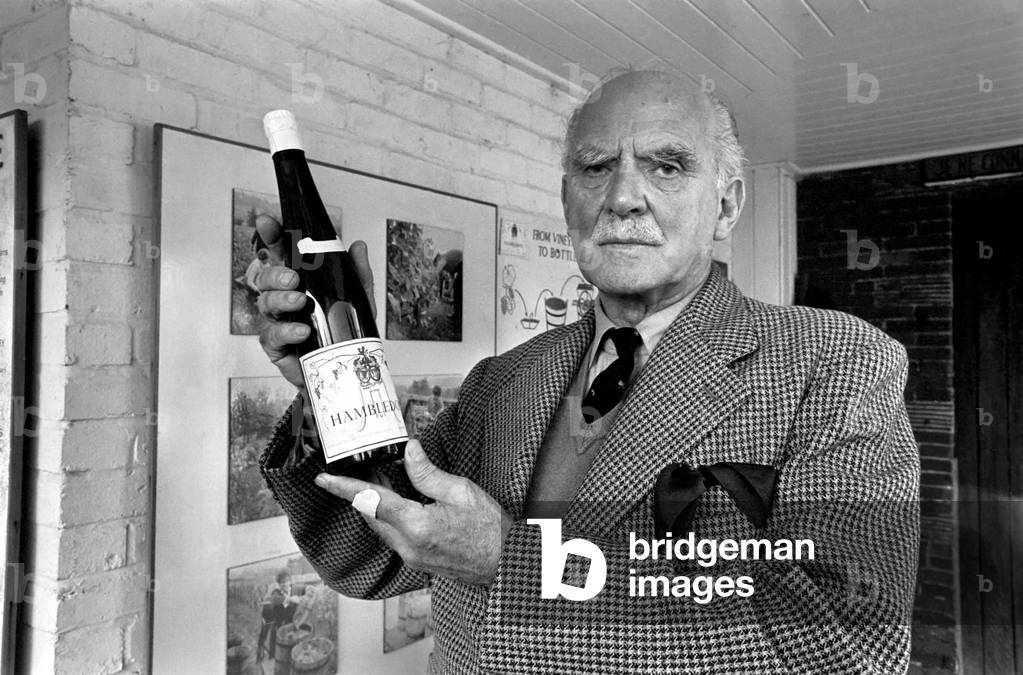 Sir Guy Salisbury Jones holds his own Hambledon bottled wine, 30th October 1969 (b/w photo)