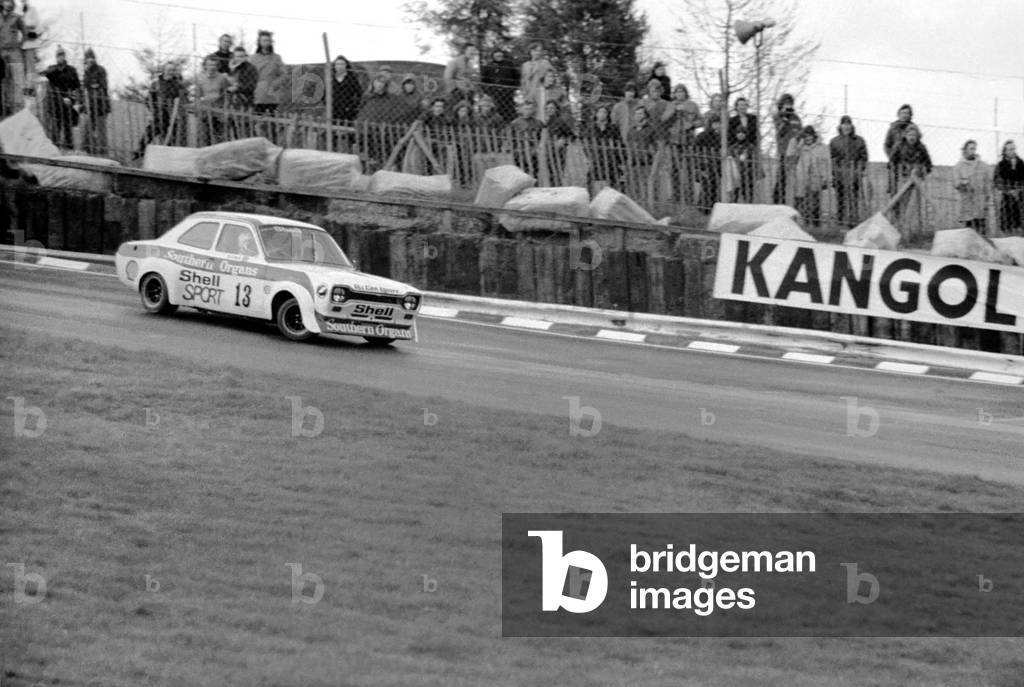 Britains ex-ski champion Divina Galica crashed her £6000 car on the second lap of her very first professional race at Brands Hatch today, 2nd February 1975 (b/w photo)