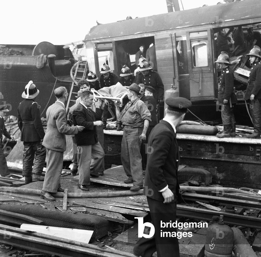 The Harrow and Wealdstone rail crash was a three train collision at Harrow and Wealdstone station, in London, at 8:19 am on 8 October 1952 (b/w photo)