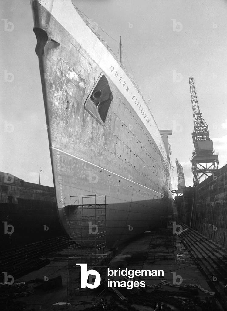 The Cunard Liner Queen Elizabeth in dry dock in Southampton for her yearly overhaul February 1962 (b/w photo)
