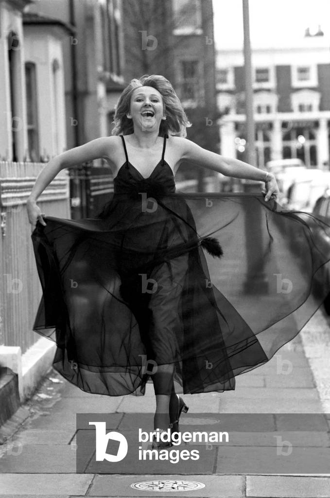 That's life. Returns to B.B.C. 1. Lois Lane complete with nightie in London today, March 1975 (b/w photo)