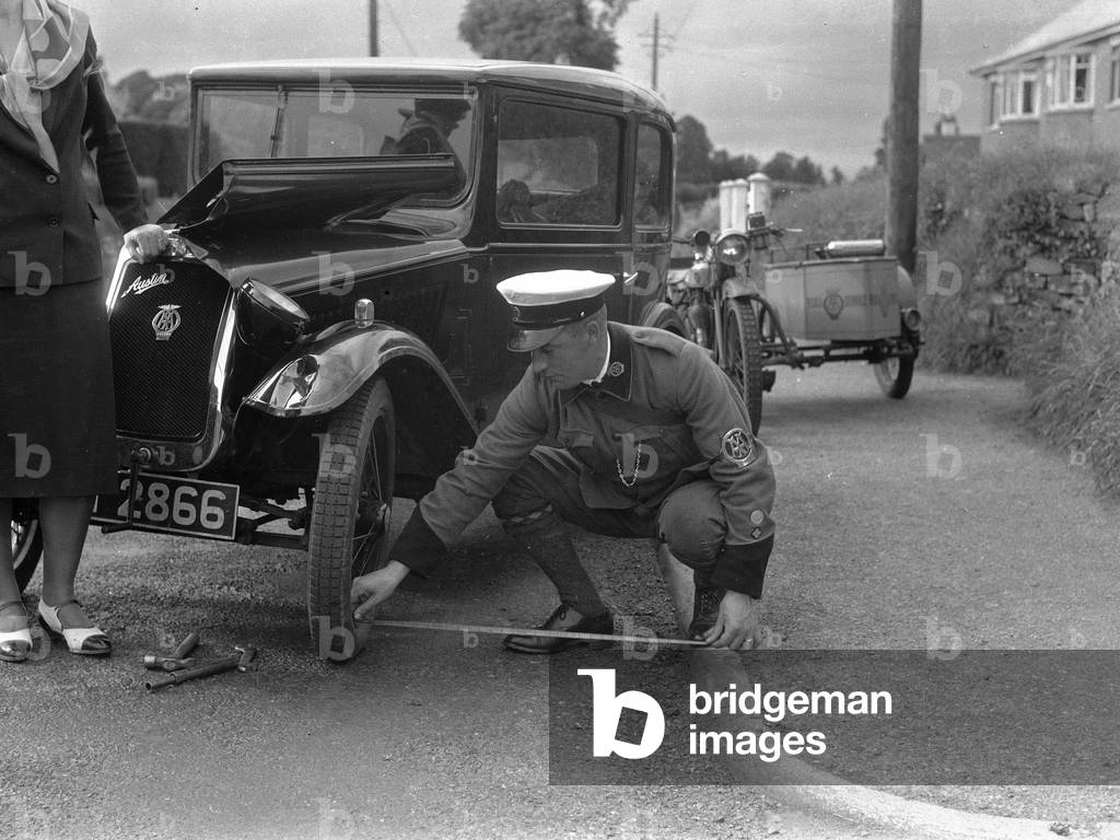 AA Patrol at Cullompten, investigating car accident.
11th June 1932
