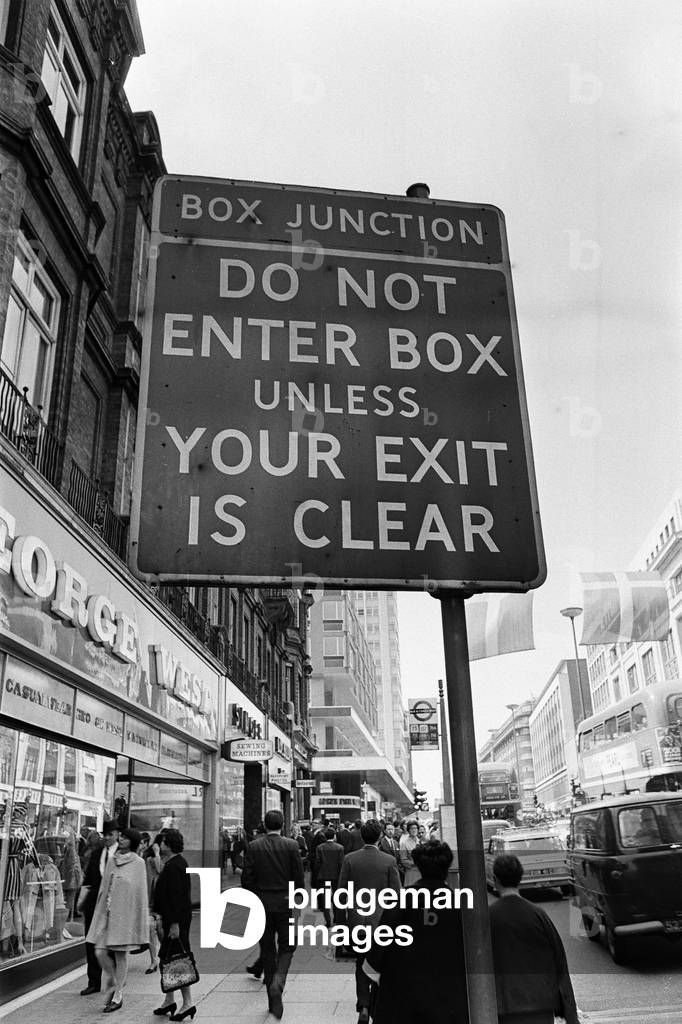 Sign warning drivers of a box junction ahead in rin Oxford Street London. 24th April 1968 (b/w photo)