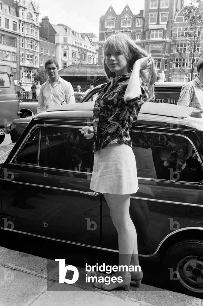Marianne Faithfull, girlfriend of Mick Jagger arriving for a press conference in Soho after the hearing at the Appeal Court, 31st July 1967 (b/w photo)