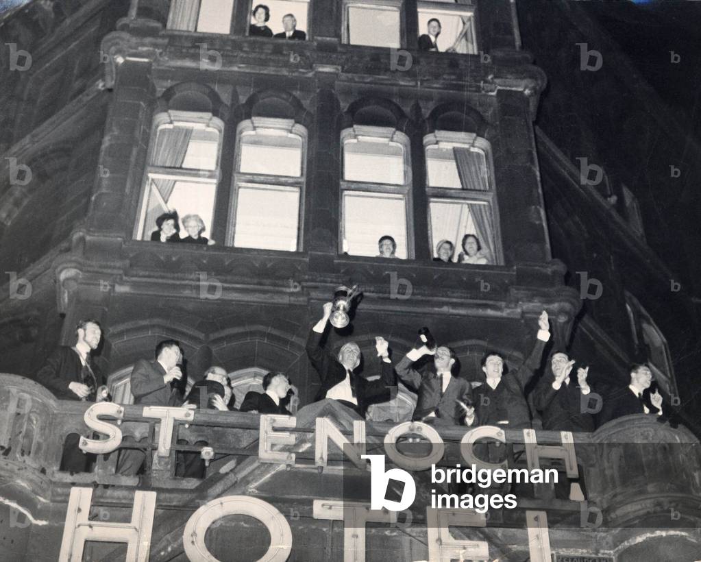 Rangers players celebrate after winning FA Cup (1-0 against Celtic), pictured on the balcony at the St Enoch Hotel in Glasgow, Scotland 27th April 1966 (photo)