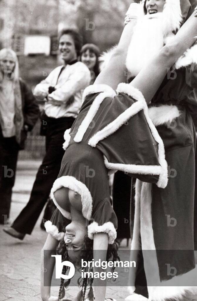 Danish disco dancer Sis Pedersen displayed rather more of herself than planned as she limbered up for the world disco dancing championship to be held in London, 17th December 1979 (b/w photo)