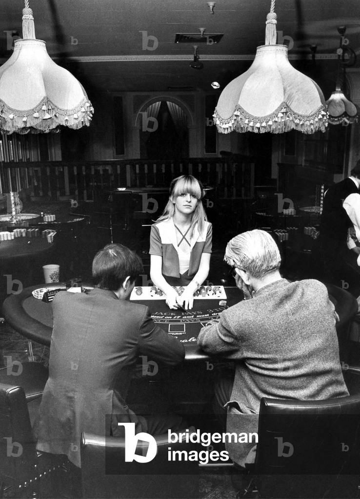 Sherrill Crabtree deals the cards at the Black jack tables in the newly opened Casino Royal in Newcastle in January 1978 (b/w photo)