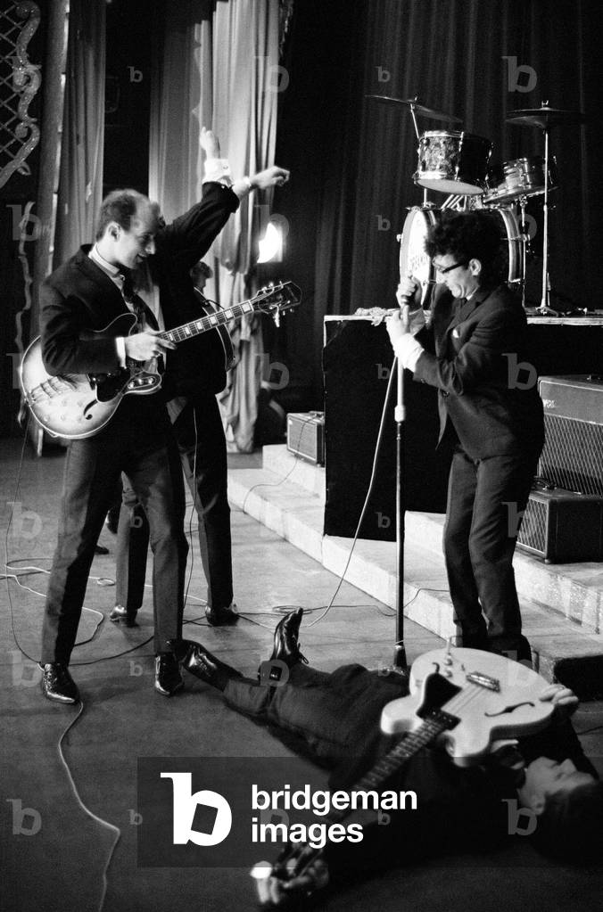 Manchester pop group Freddie and the Dreamers performing on stage at the Britannia Theatre in Great Yarmouth, Norfolk. The group consists of singer Freddie Garrity with band members Roy Crewdson, Pete Birrell, Derek Quinn and Bernie Dwyer. 8th September 1963 (b/w photo)
