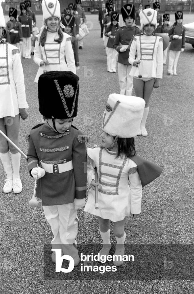 Passing Out Parade: 4 year old Joanne Cardy and 6 year old Kevin Hunt both from Brightlingsea, Essex, April 1977 (b/w photo)