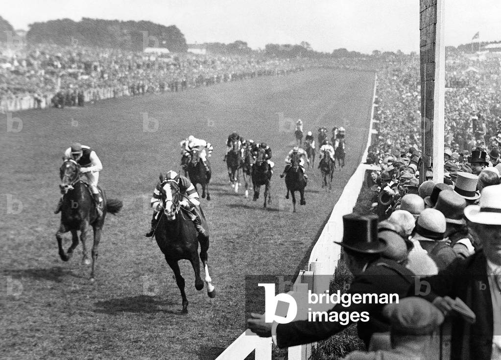 Felstead, ridden by Ossie Bells stable jockey Harry Wragg in action to win the Epsom Derby, June 1928 (b/w photo)