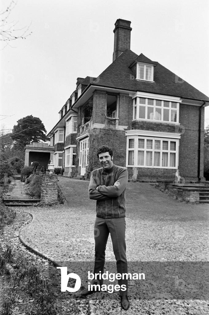 Tom Jones, at his new ¿65000 pound home in Weybridge, Surrey, 29th December 1968 (b/w photo)