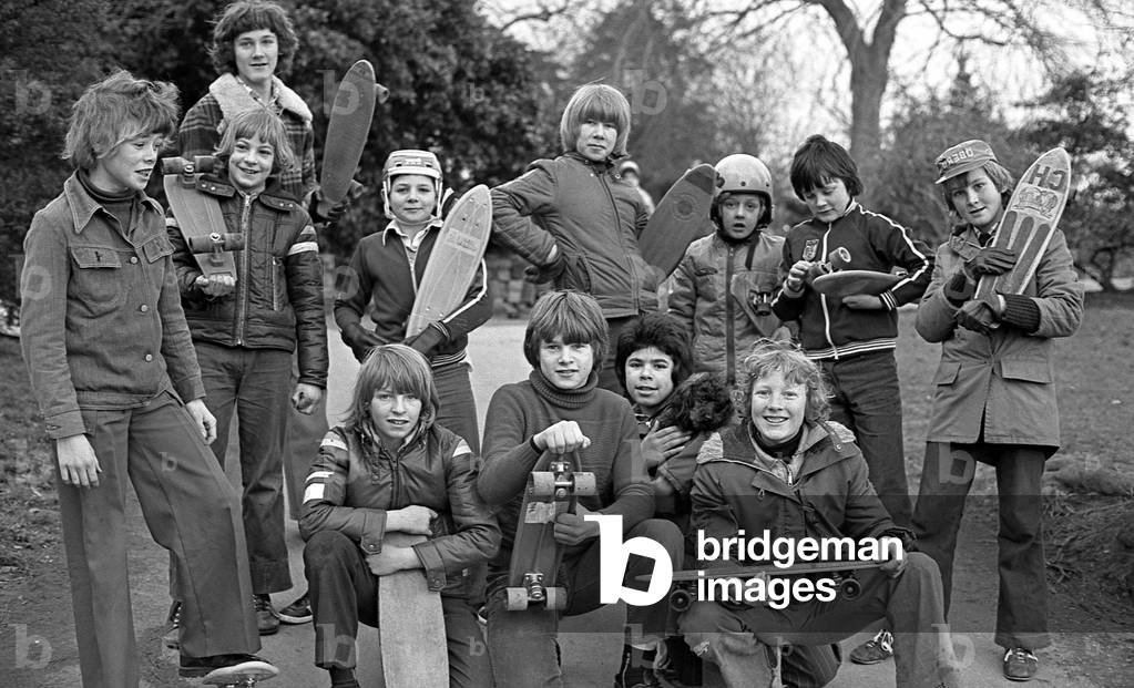 Leamington youngsters are enjoying their Christmas presents - skateboards, in Jephson Gardens. 30th December 1977 (b/w photo)