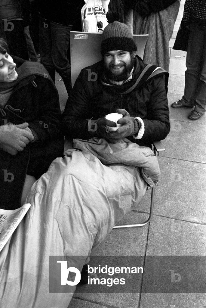 Elton John fans spent the night in sub-zero temperatures to make sure of getting tickets for the superstars concerts at Newcastle City Hall. 40 campers had taken their places on the steps in advances of Elton's March 22nd and 23rd gigs. 2nd February, 1979 (b/w photo)