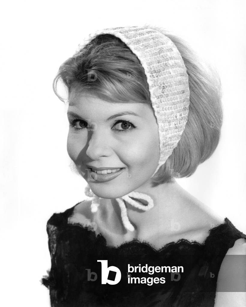 Model Liz Duke wearing a headscarf. 
December 1962