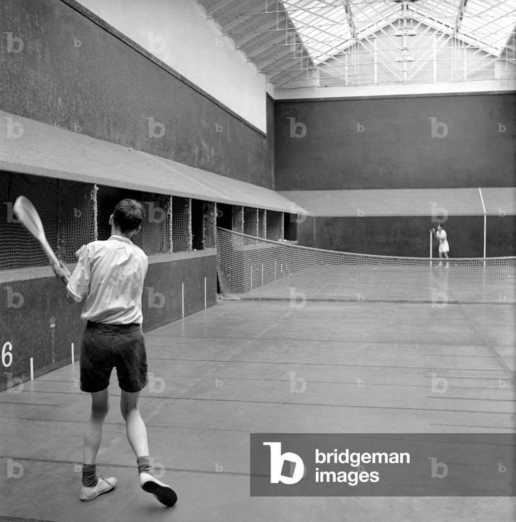 Sport: Real Tennis: Before Wimbledon and during the reign of Henry VIII Real Tennis was invented. The game similar to tennis is played on an indoor court, 1960 (b/w photo)