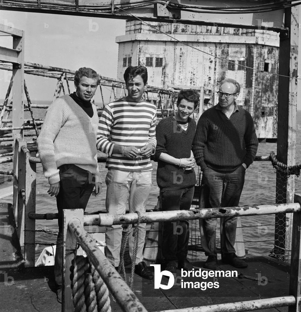 Radio City Pirate radio station in the North Sea situated on a old World War Two fort. L - R Ian Macrae, Tatty Tom Edwards, Leslie Dunne and Paul Elvey. 31st August 1965 (b/w photo)