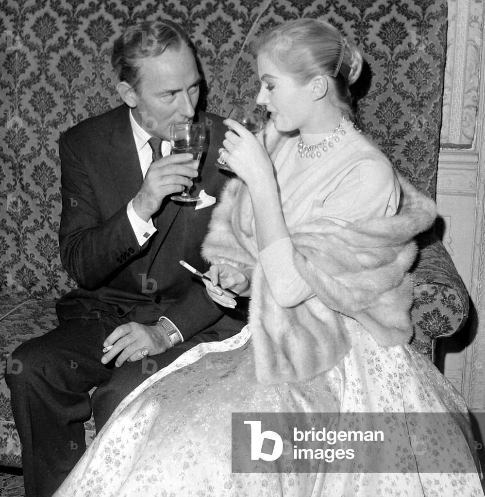 Anita Ekberg seen here attending a Press reception in London with actor Michael Wilding, 17/11/1955 (b/w photo)