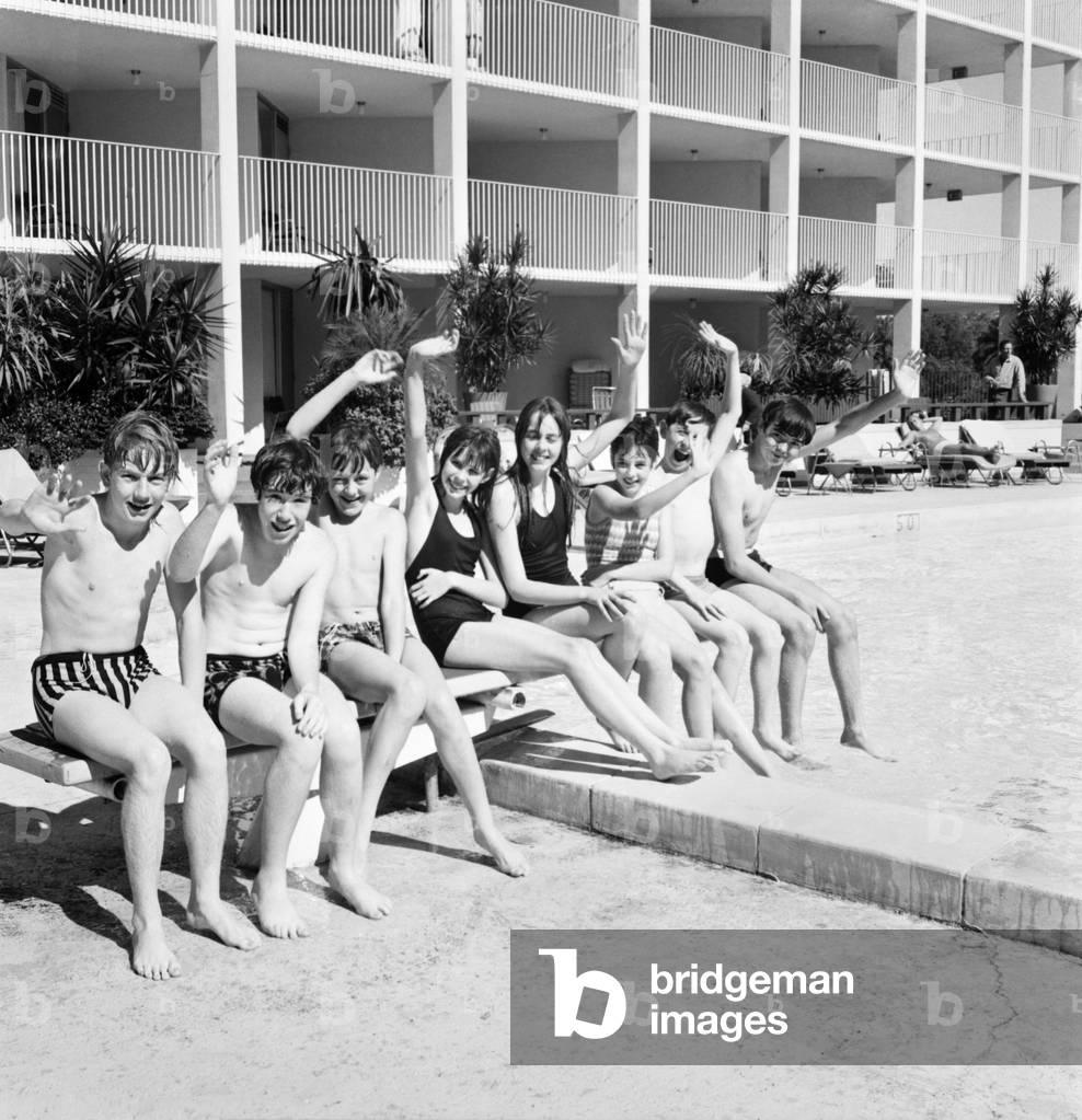 Holiday makers bathing in the pool at the Robert Meyer Hotel, Orlando, Florida, USA. November 1969