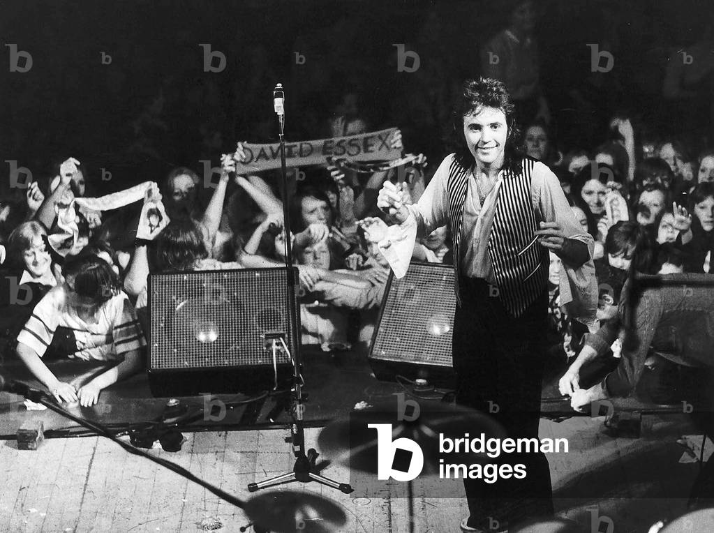 Actor and Musician David Essex on the road with his band during the first four days of their British tour, 17th October 1976 (b/w photo)