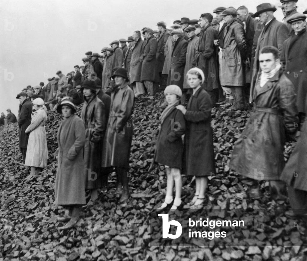 Coal Mining Accidents. Families of miners working in Gresford Colliery, await news of their loved ones after an explosion occured