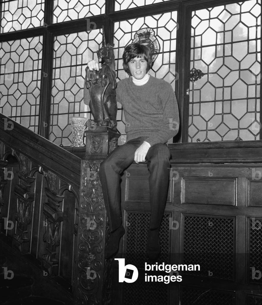 Barry Gibb of the Bee Gees pop group pictured at the home of the group's manager Robert Stigwood in Stanmore, London February 1969 (b/w photo)