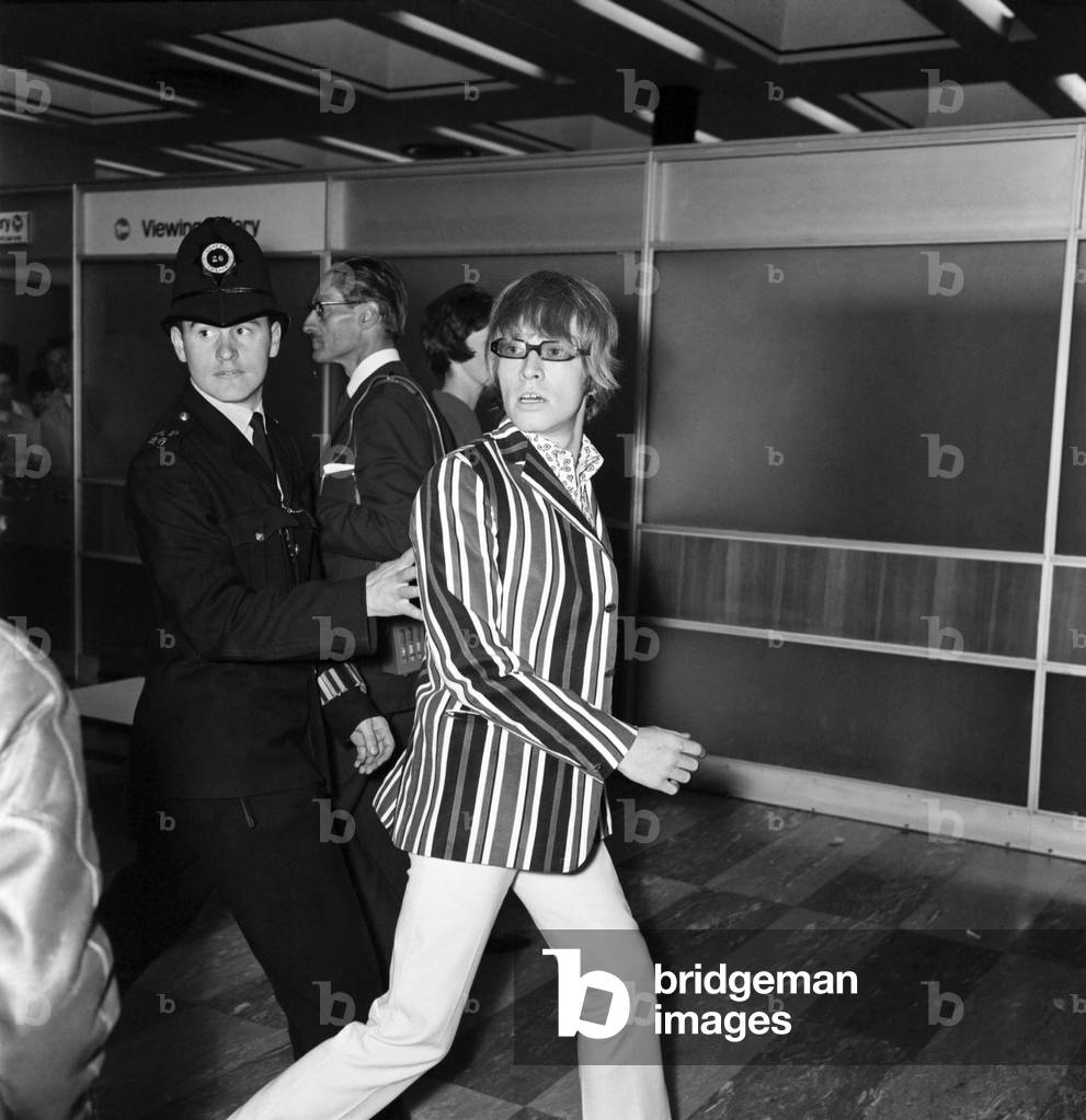 Brian Jones of The Rolling Stones at London Airport on 23 June 1966 en route for America, to begin a month long tour