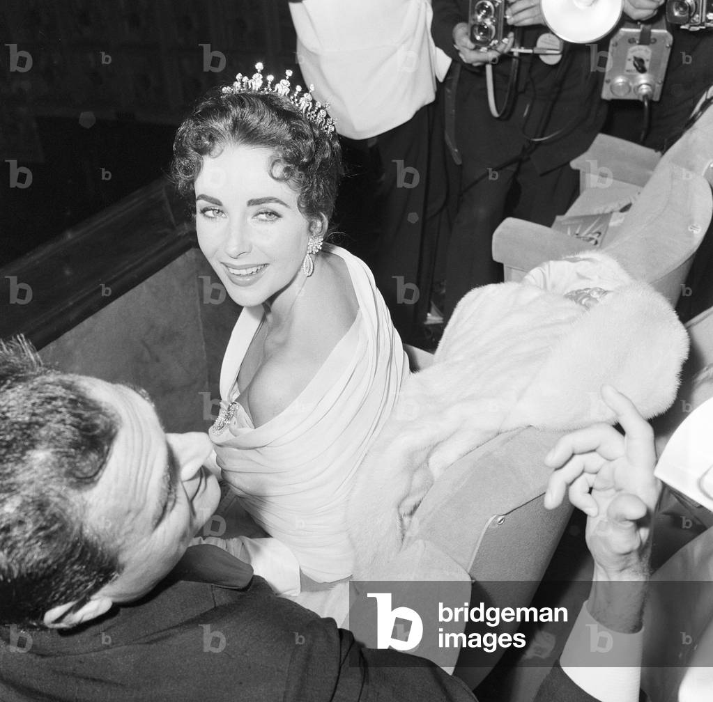 Elizabeth Taylor pictured on opening night of the Cannes Film Festival 1957, where her husband and film producer Mike Todd, is promoting new film Around the World in 80 Days. Cannes, France, 6th May 1957.
