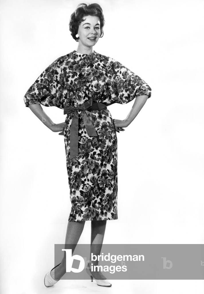 Model Jackie Jackson wearing floral patterned dress. 
September 1960
