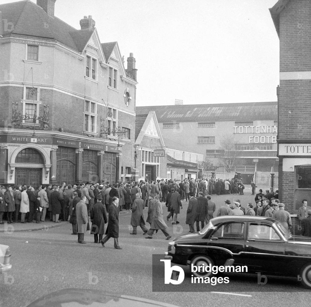 Tottenham supporters queue outside White Hart Lane for tickets to their European Cup match against Dukla Prague. February 1962 (photo)