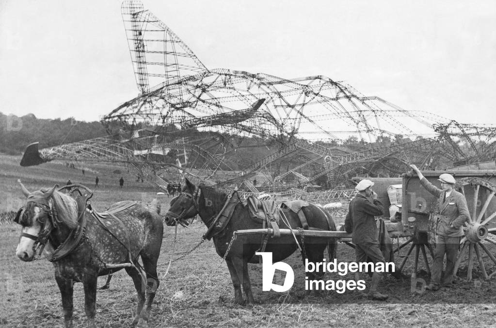 Removing the bodies of the victims of the R101 airship crash from the scene of the disaster near Beauvais in France, 5th October 1930 (b/w photo)